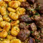 Cajun Steak Bites and Cheesy Garlic Shells Skillet Recipe