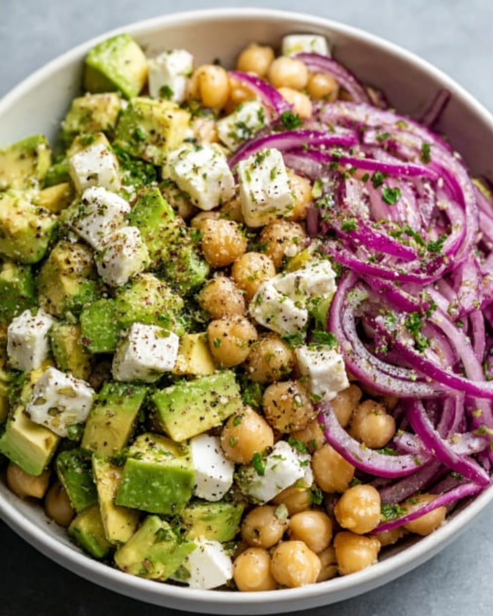 A close-up of a baked casserole in a clear glass dish with a golden brown top layer mixed with crispy reddish-brown bacon pieces. Below this, there is a bright yellow cheesy layer mixed with bits of browned sausage. The inside is light and fluffy with white scrambled eggs and specks of green herbs, giving it a soft texture. A metal spoon lifts a square piece, showing the layers clearly with the browned crust on the edges. The dish sits on a white marbled texture. photo taken with an iphone --ar 4:5 --v 7